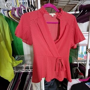 Red and white polka-dot v-neck blouse size small